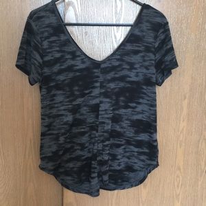 Loose fitting V-neck.